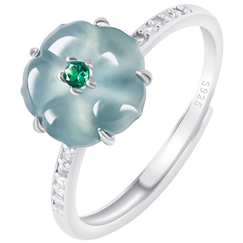 BoxUnboxed adjustable ring featuring a blue water jadeite peach blossom, green accent, and cubic zirconia in platinum.