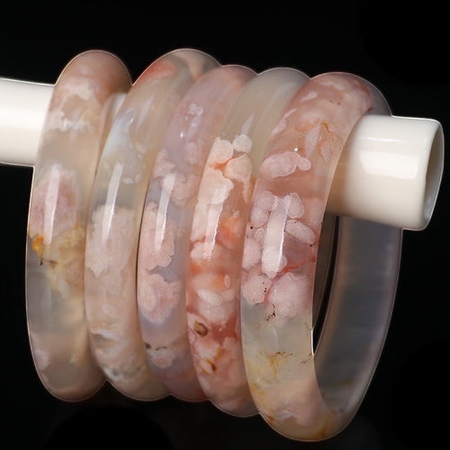 BoxUnboxed Natural Flower Agate Sakura Bangles with delicate pink floral inclusions, polished smooth stone.