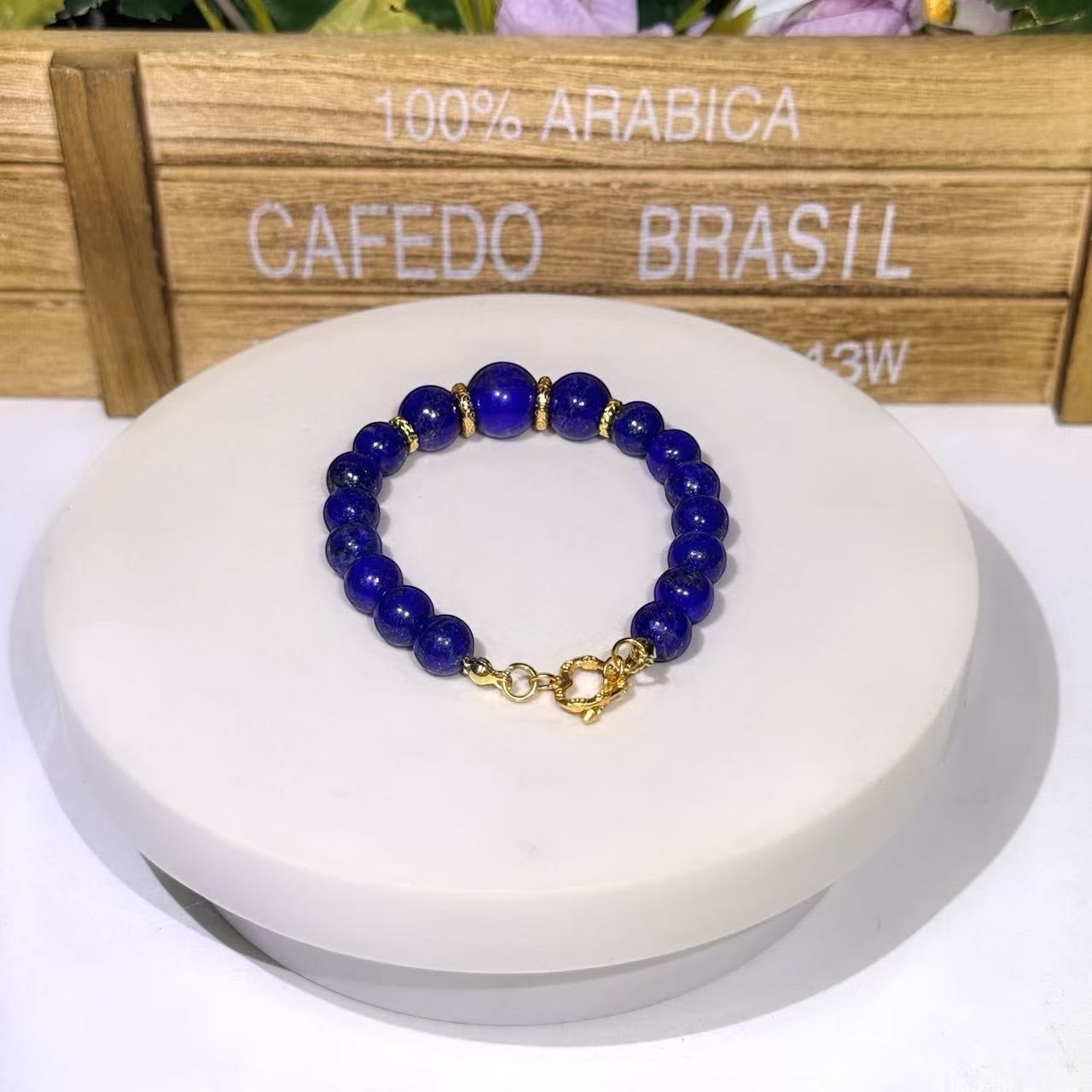 BoxUnboxed Afghan Lapis Lazuli beaded bracelet with gold-plated accents and a secure gold toggle clasp.
