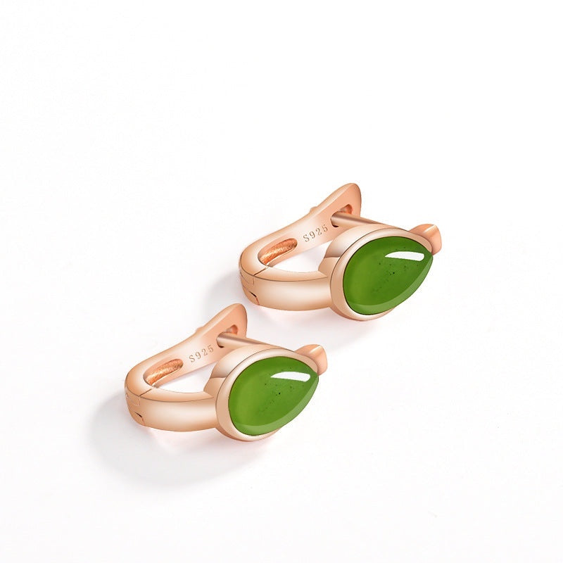 BoxUnboxed huggie earrings featuring teardrop-shaped natural nephrite jade in rose gold plated sterling silver