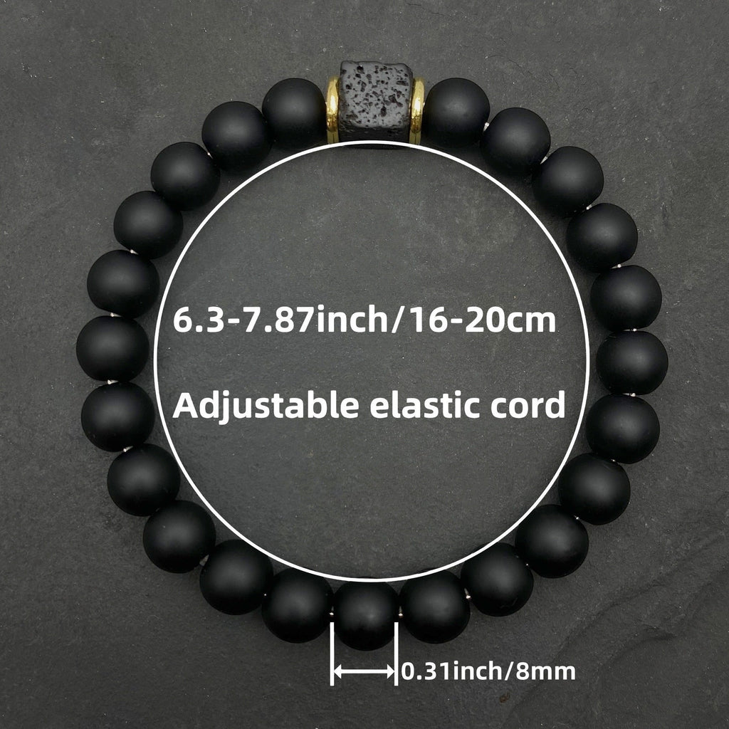 BoxUnboxed Obsidian & Volcanic Stone Stack Bracelet with matte black obsidian beads and a central lava stone accent.