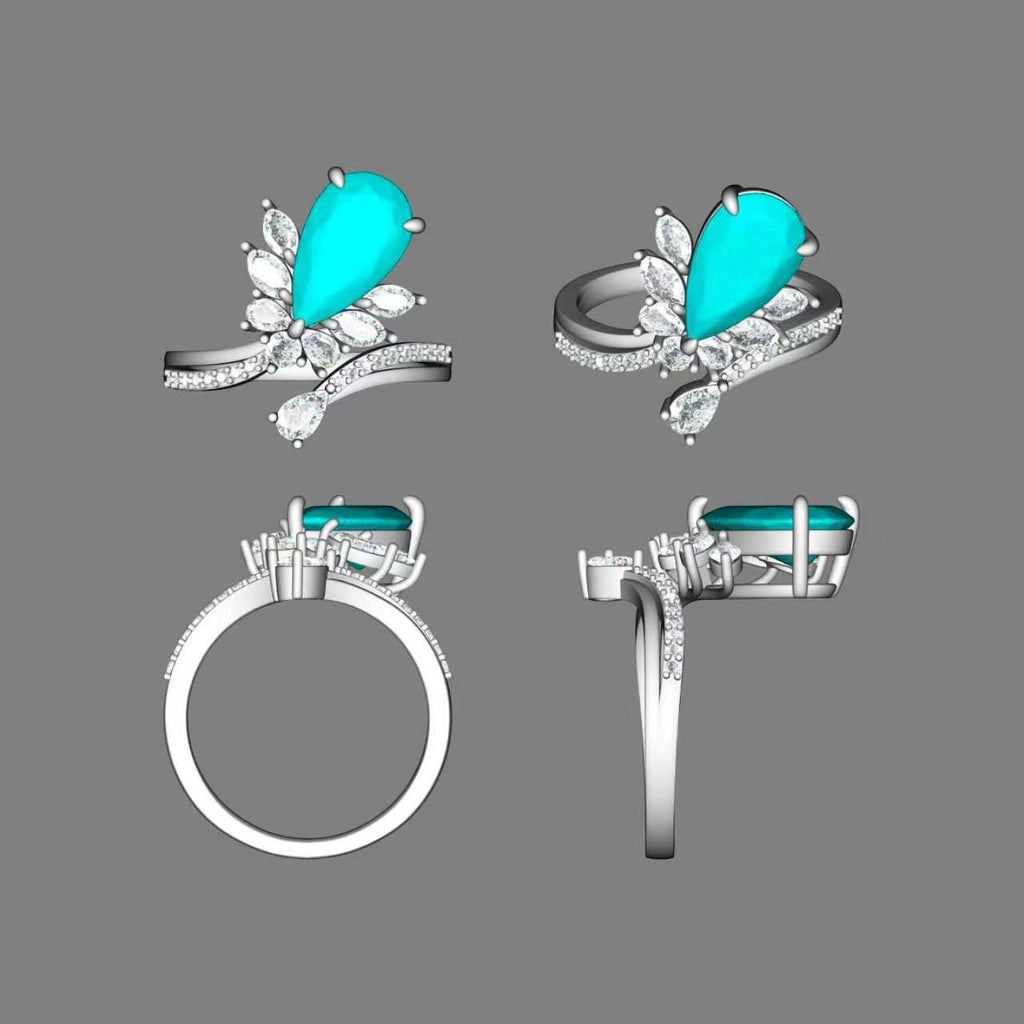 BoxUnboxed pear cut vivid blue lab-grown diamond ring with marquise accent stones set in polished gold