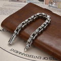 BoxUnboxed The Rock Sovereign geometric link bracelet in solid 925 silver with a 10mm profile and chiseled rock facets.