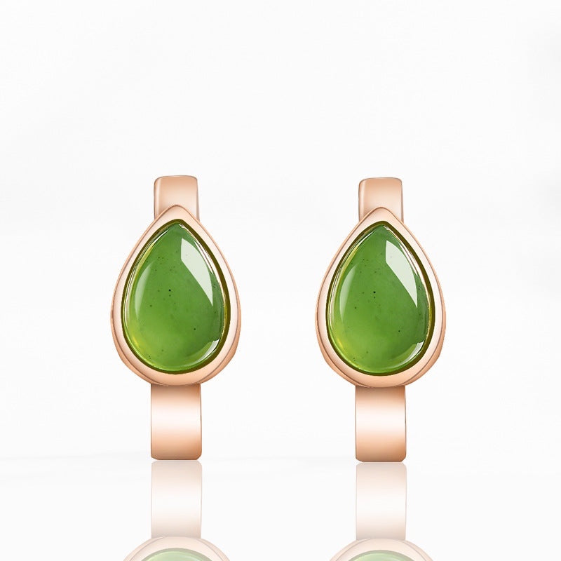 BoxUnboxed rose gold huggie earrings featuring teardrop-shaped natural nephrite jade stones in a bezel setting.